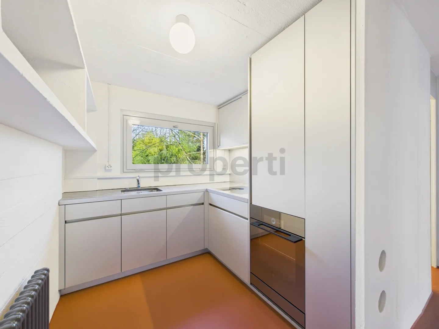 Wohnen in einer Ikone der Schweizer Architektur | Einzigartige Maisonettewohnung im denkmalgeschützten Atelier-5-Ensemble in Flamatt - Photo 4 of 13