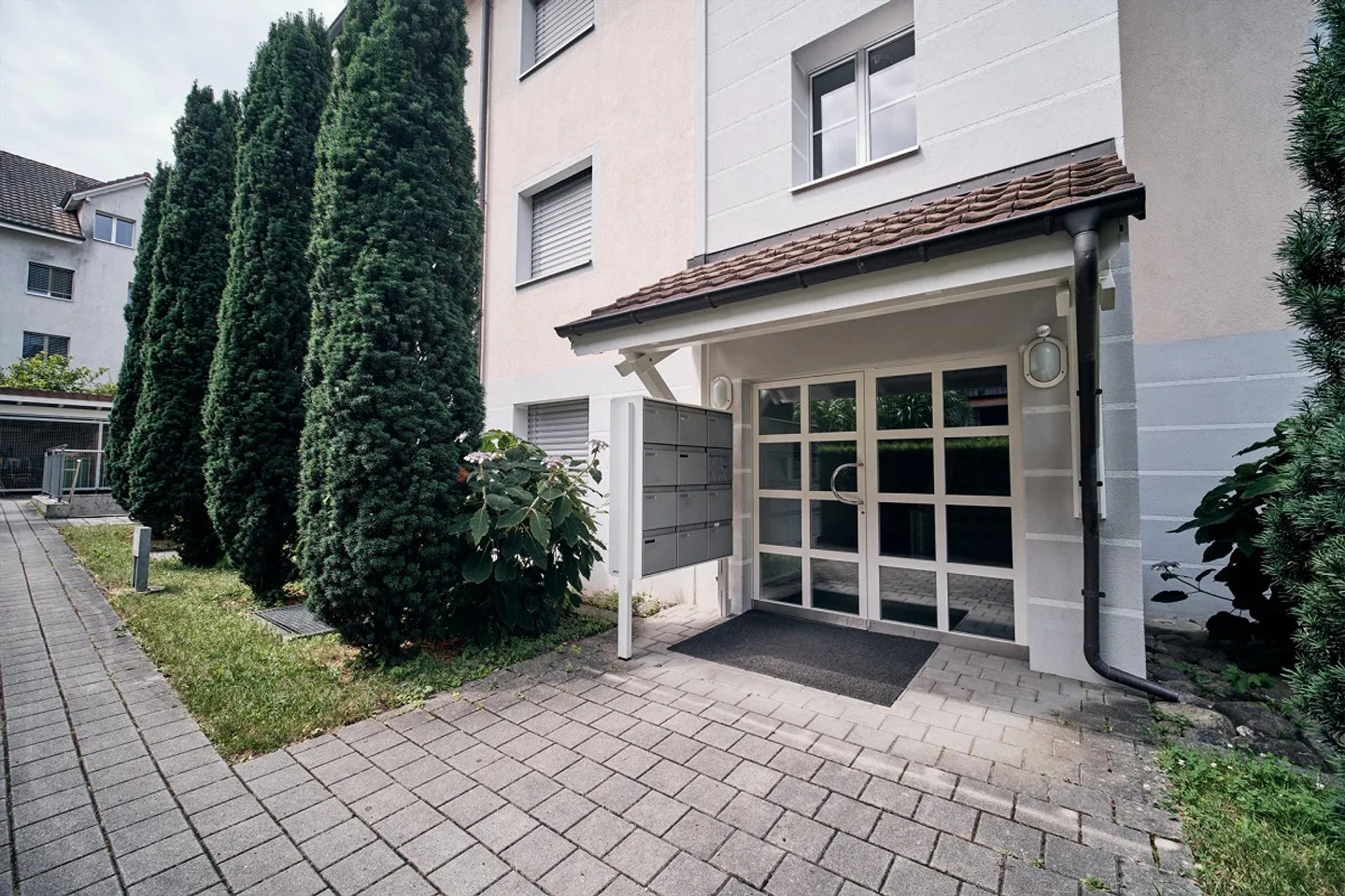 Appartamento di 3,5 stanze con area giardino in una posizione centrale e tranquilla - Foto 3 di 16