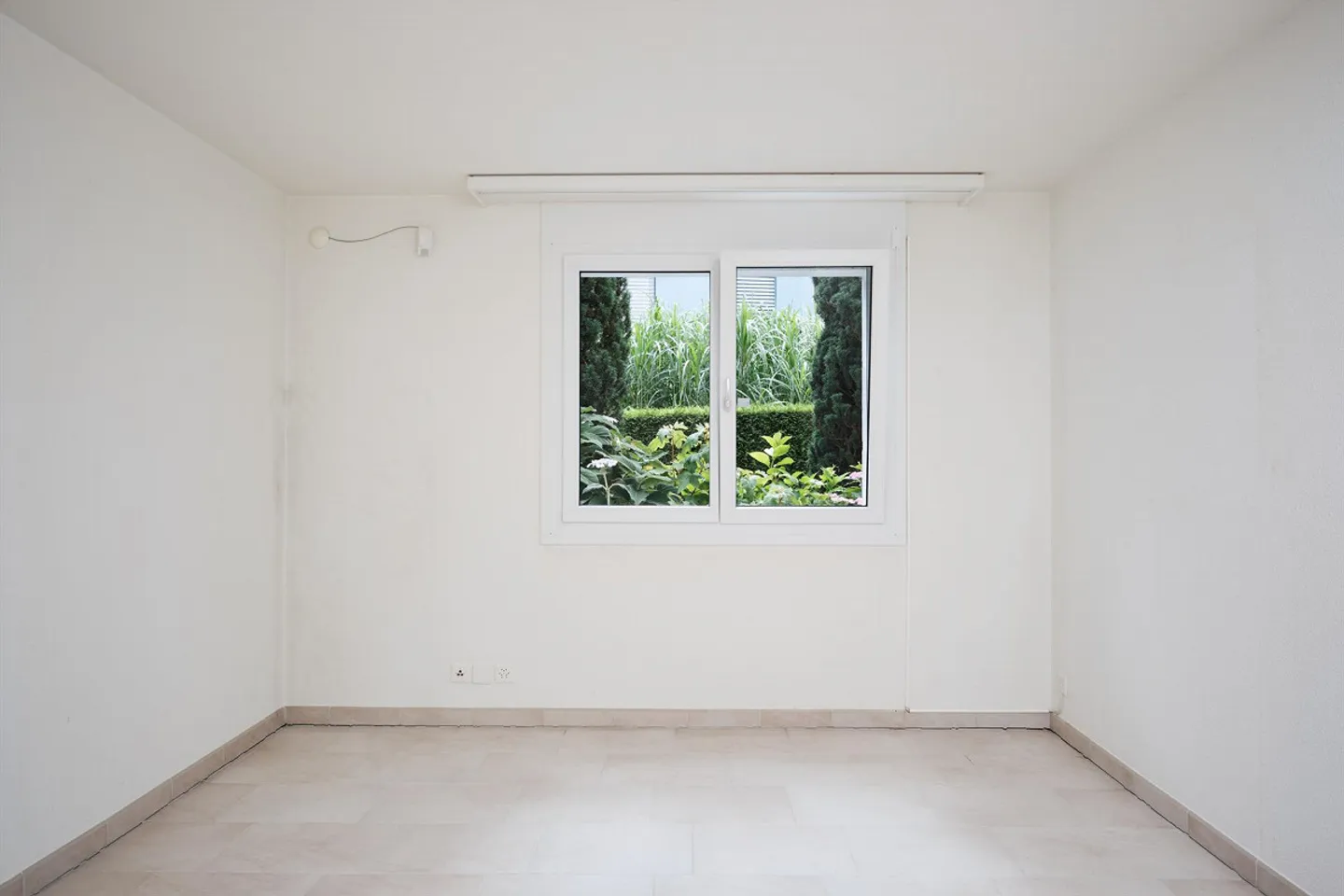 Appartamento di 3,5 stanze con area giardino in una posizione centrale e tranquilla - Foto 11 di 16
