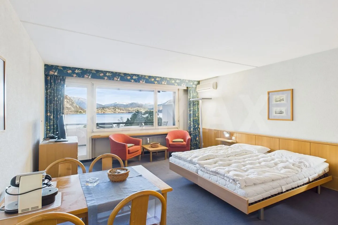 Sensazione di vacanza tutto l'anno, a pochi minuti da Lugano Appartamento 2.5 locali con vista lago e terrazza - Foto 3 di 12