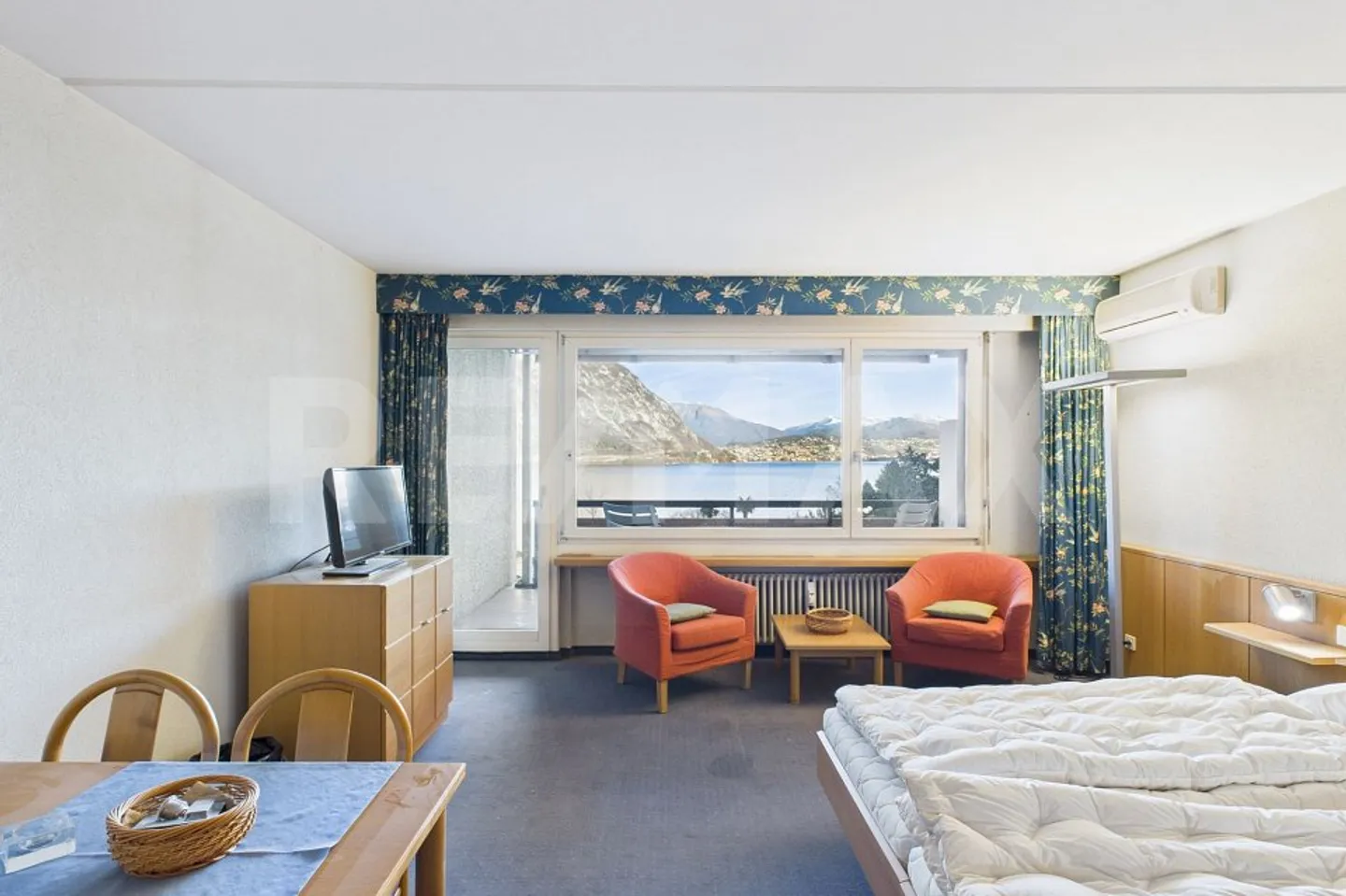 Sensazione di vacanza tutto l'anno, a pochi minuti da Lugano Appartamento 2.5 locali con vista lago e terrazza - Foto 5 di 12