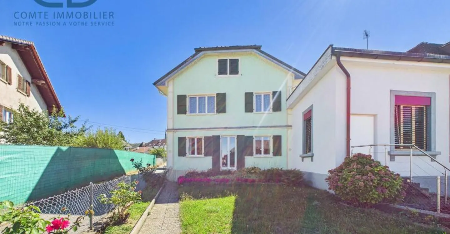 Maison contiguë de 5.5 pièces avec jardin, garage et beau potentiel - Photo 1 of 13