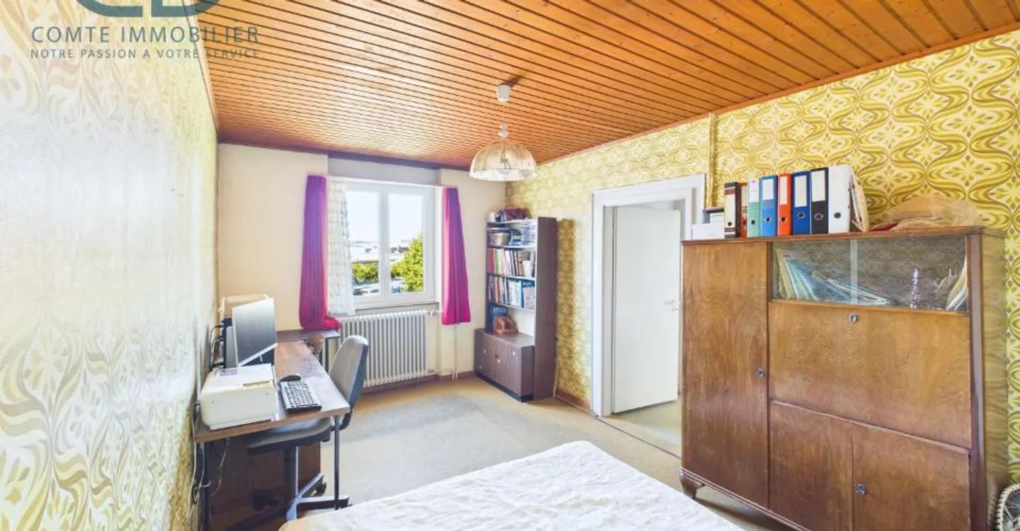 Maison contiguë de 5.5 pièces avec jardin, garage et beau potentiel - Photo 6 of 13