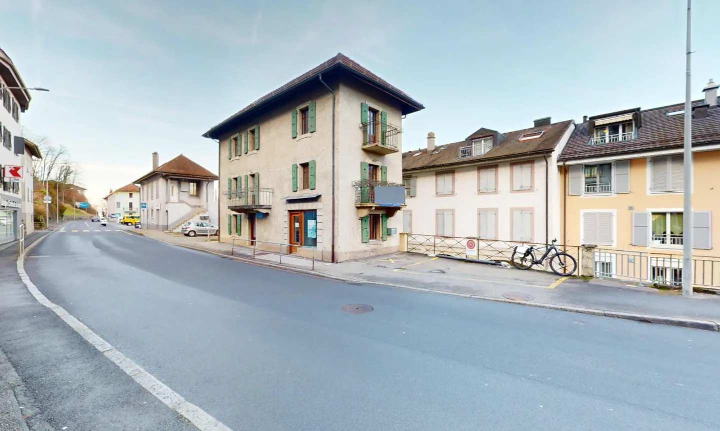 Exclusive: mixed-use building on the main street - Photo 1 of 13