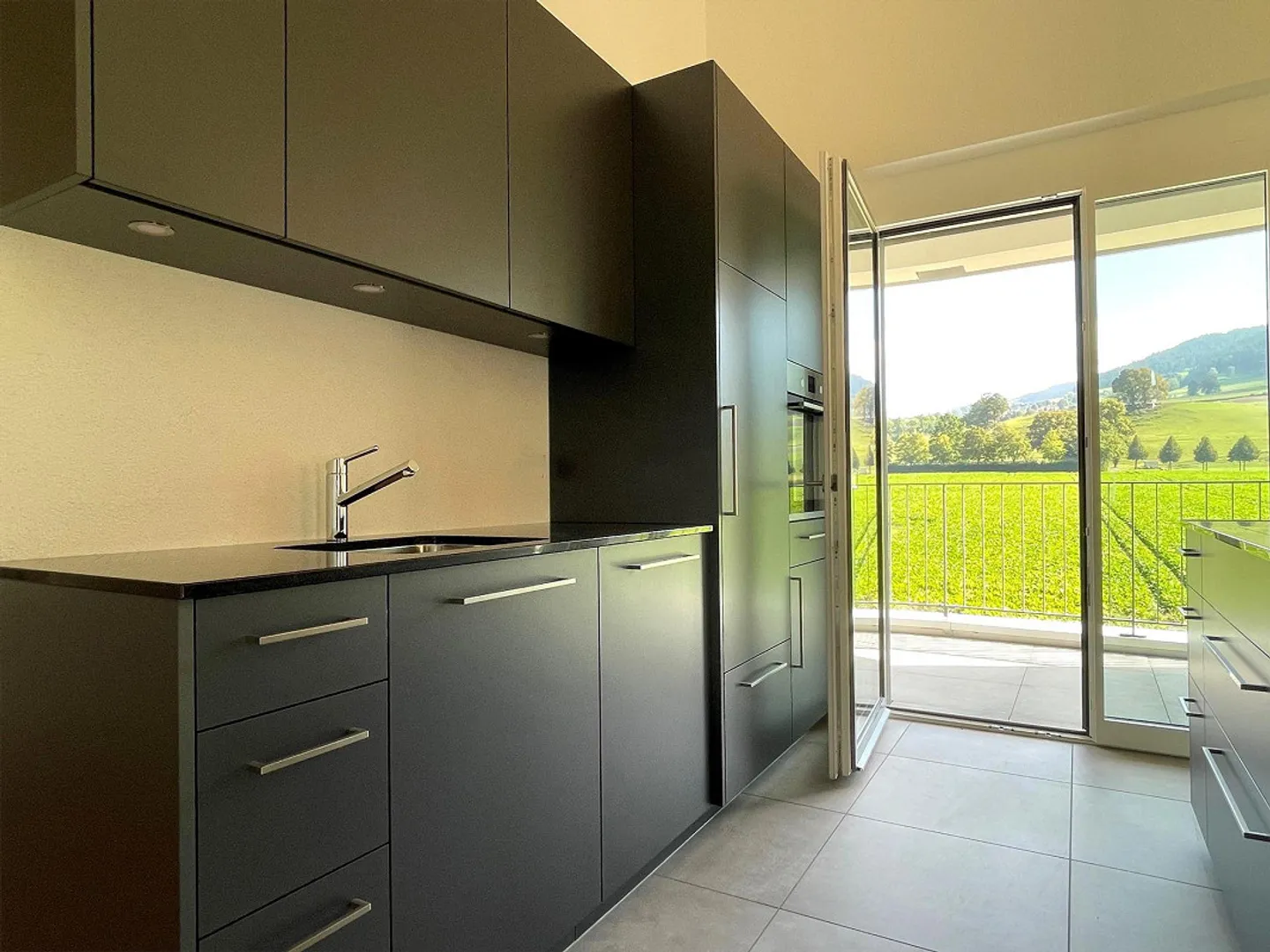 Modernes Penthouse mit Blick ins Grüne - Foto 1 von 10