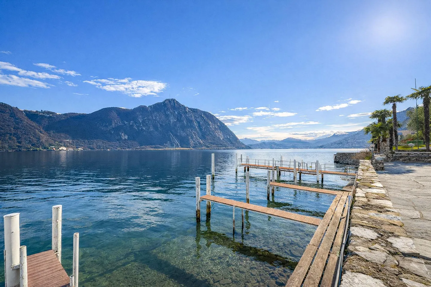 2.5 locali vista lago in residenza con piscina e darsena a Bissone - Photo 7 of 10