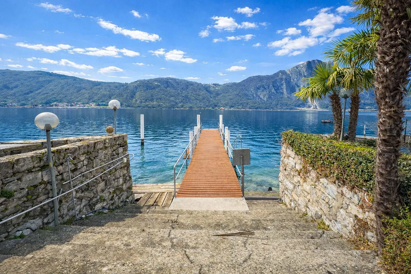 2.5 locali vista lago in residenza con piscina e darsena a Bissone - Photo 8 of 10