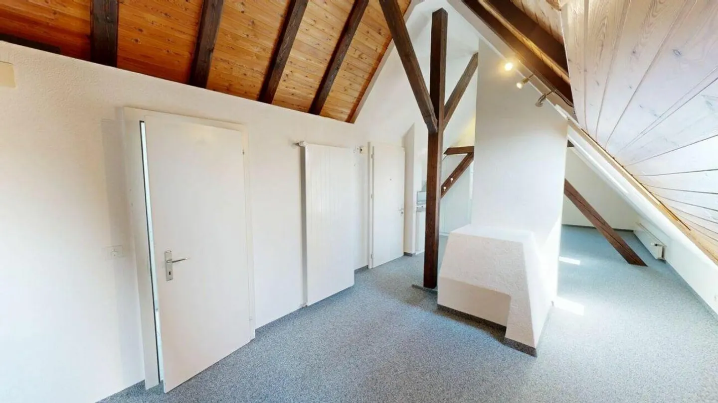 Charmante Dachwohnung - Foto 3 von 7