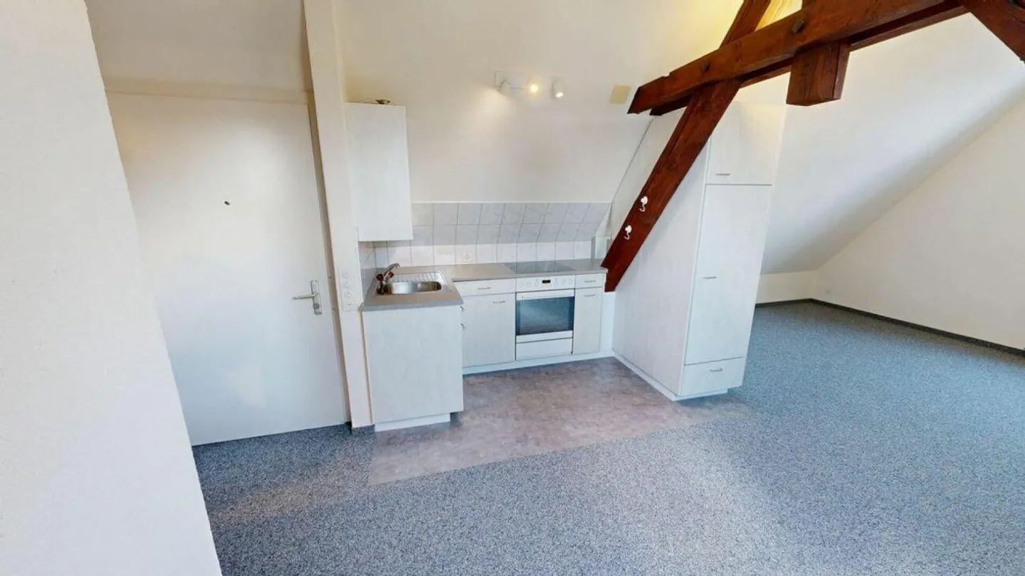 Charmante Dachwohnung - Foto 4 von 7