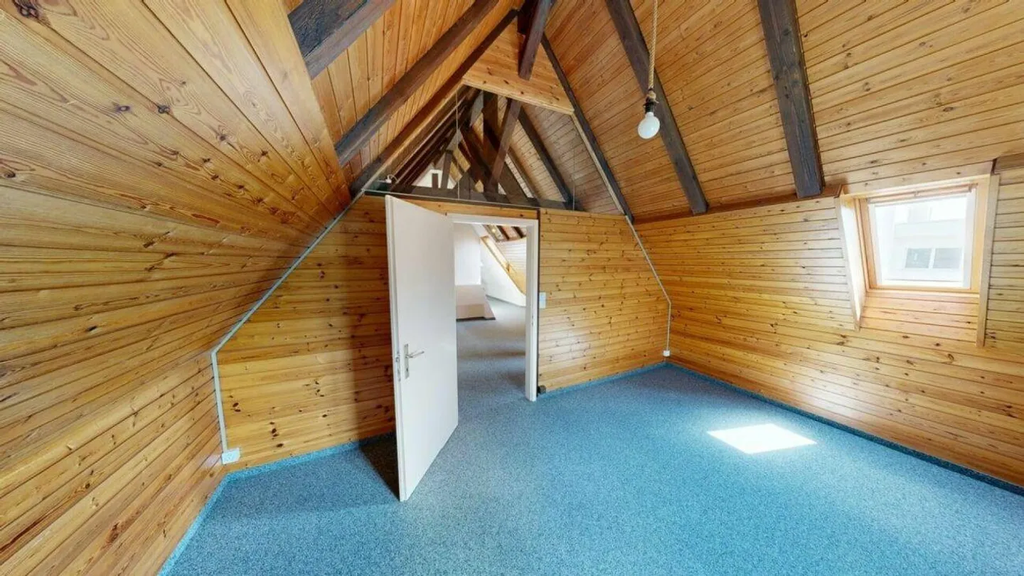 Charmante Dachwohnung - Foto 5 von 7