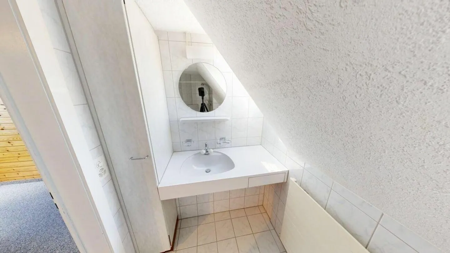Charmante Dachwohnung - Foto 7 von 7