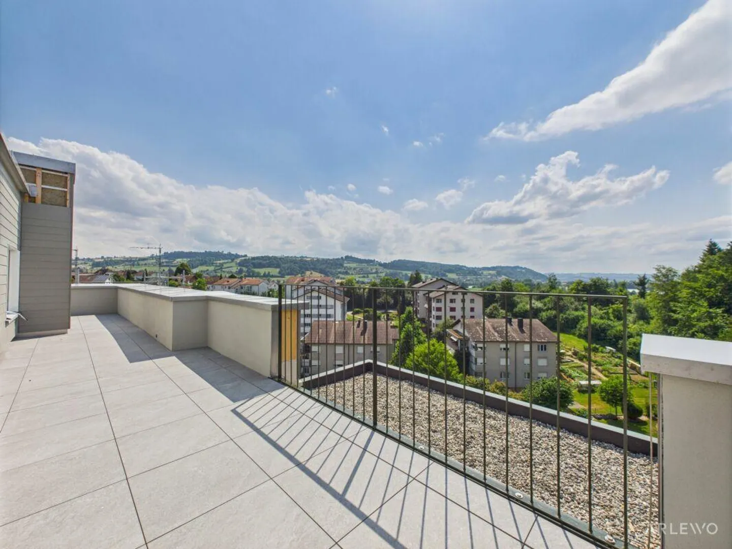Modern Living Above the Rooftops of Sursee - Photo 1 of 11