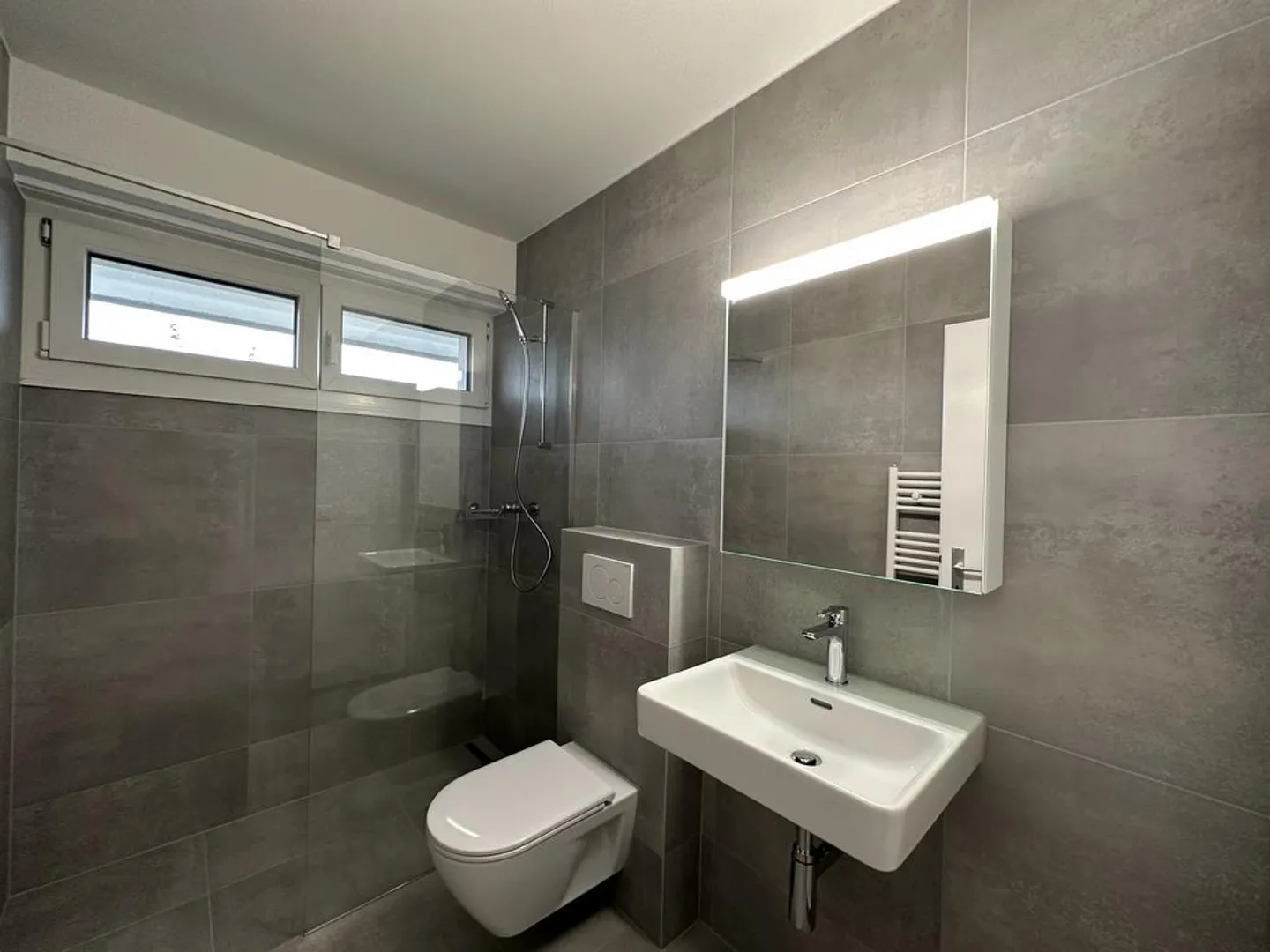 Moderne 2.5-Zimmerwohnung im 1. UG mit Terasse - Foto 5 von 7