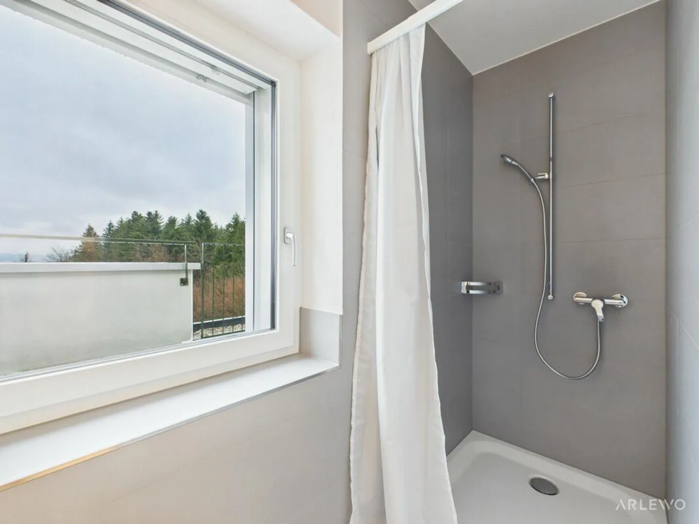 Modern Living Above the Rooftops of Sursee - Photo 10 of 11