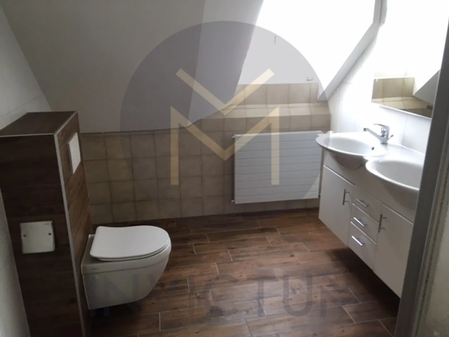 Appartement Central à Haut Rendement - Photo 3 sur 5