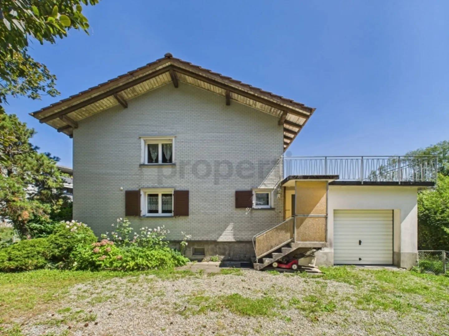 Charming single-family home with large outdoor space and plenty of potential - Photo 5 of 13