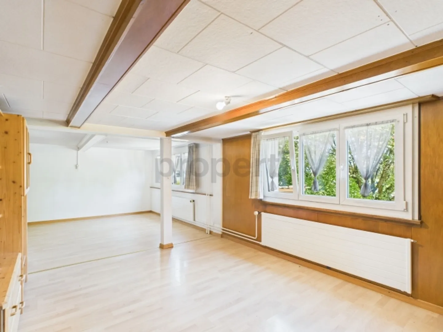 Charming single-family home with large outdoor space and plenty of potential - Photo 6 of 13