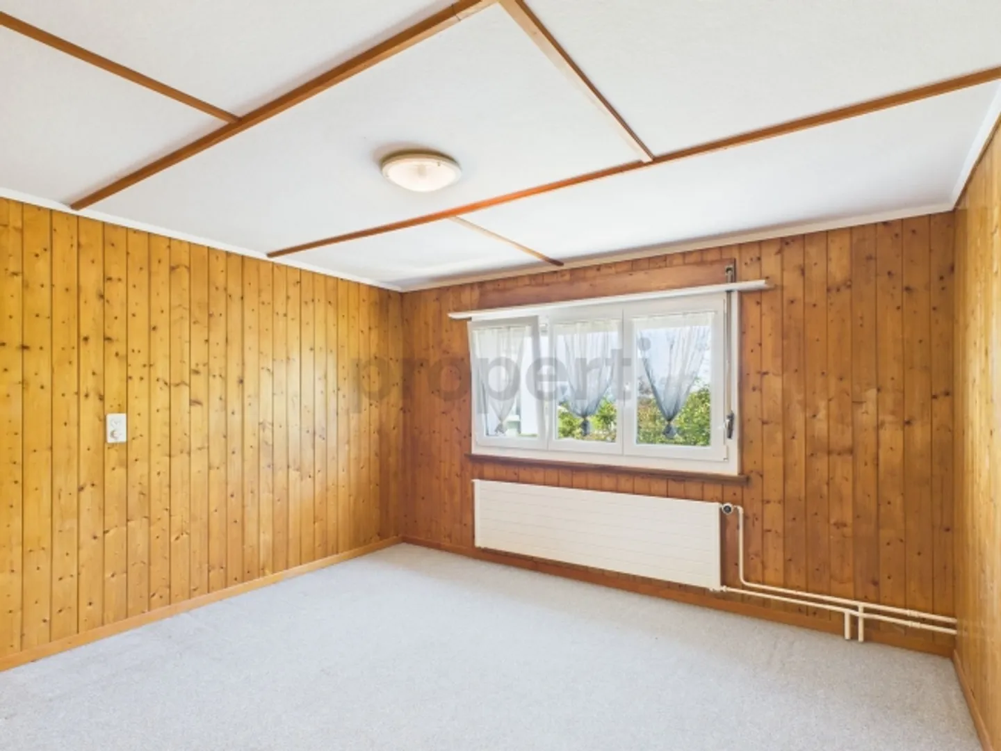 Charming single-family home with large outdoor space and plenty of potential - Photo 8 of 13