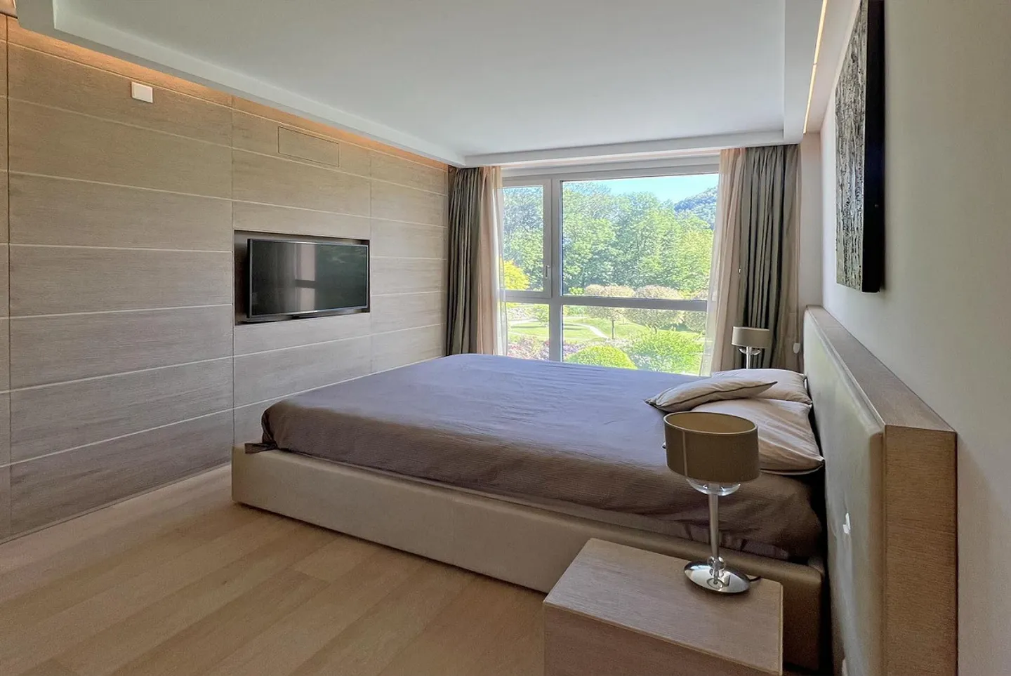 STUPENDO E MODERNO APPARTAMENTO DI 4,5 LOCALI CON TERRAZZA E VISTA LAGO A MUZZANO - Foto 6 di 9