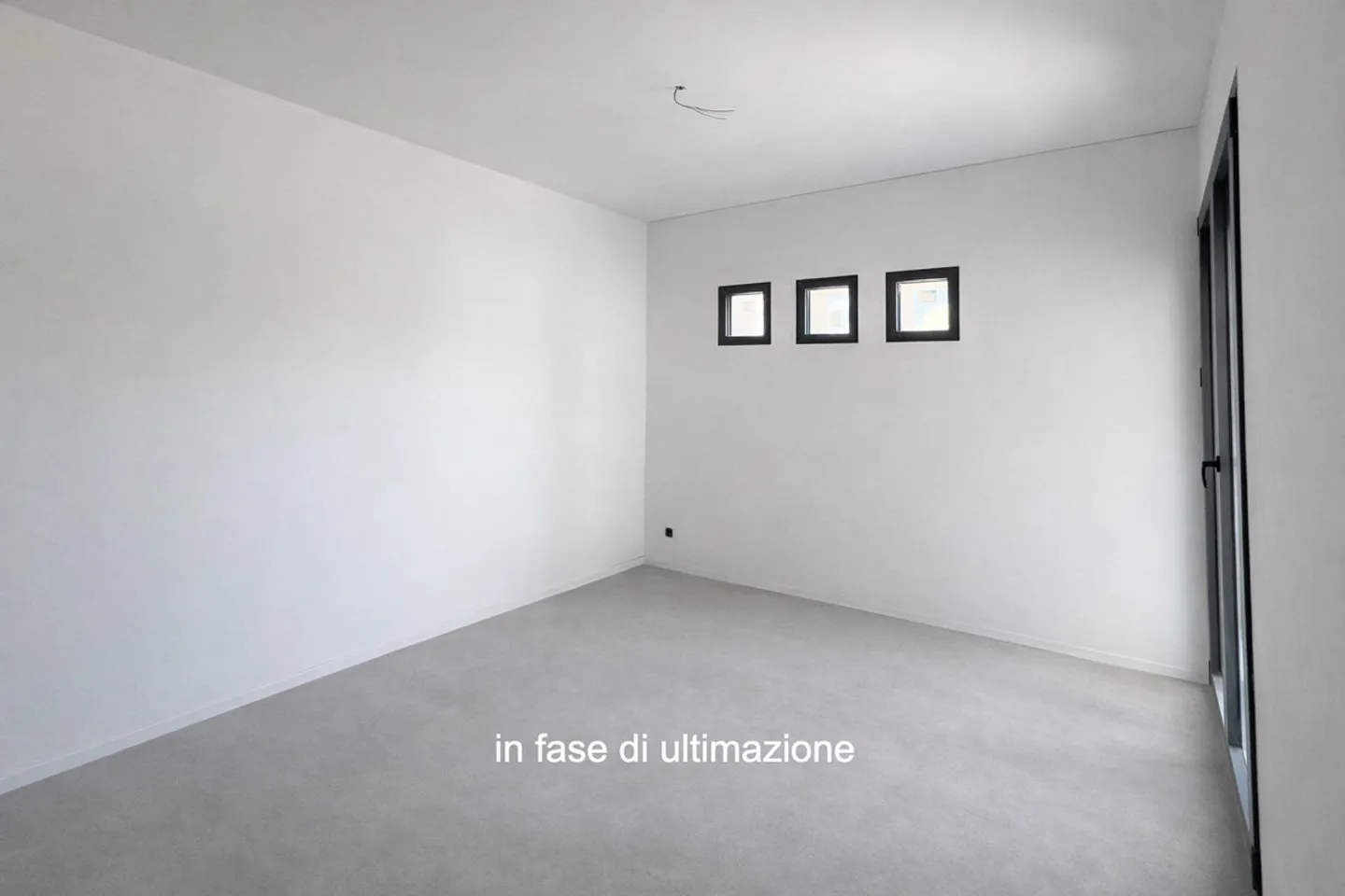 Moderne und neue 3,5-Zimmer-Duplexwohnung mit Garten in Melano - Foto 2 von 7