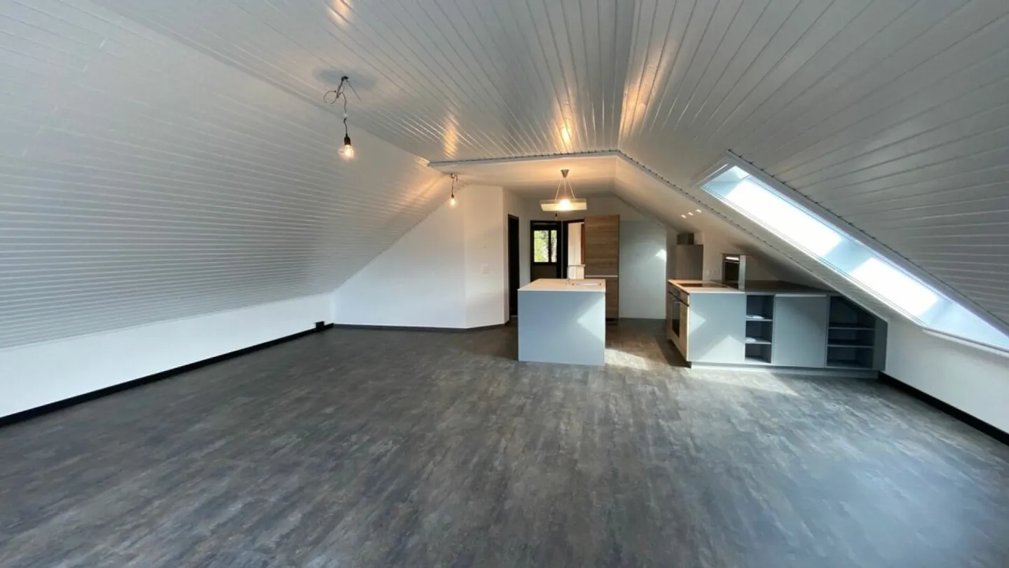 Appartamento mansardato di 3 ½ stanze con giardino - Foto 2 di 7