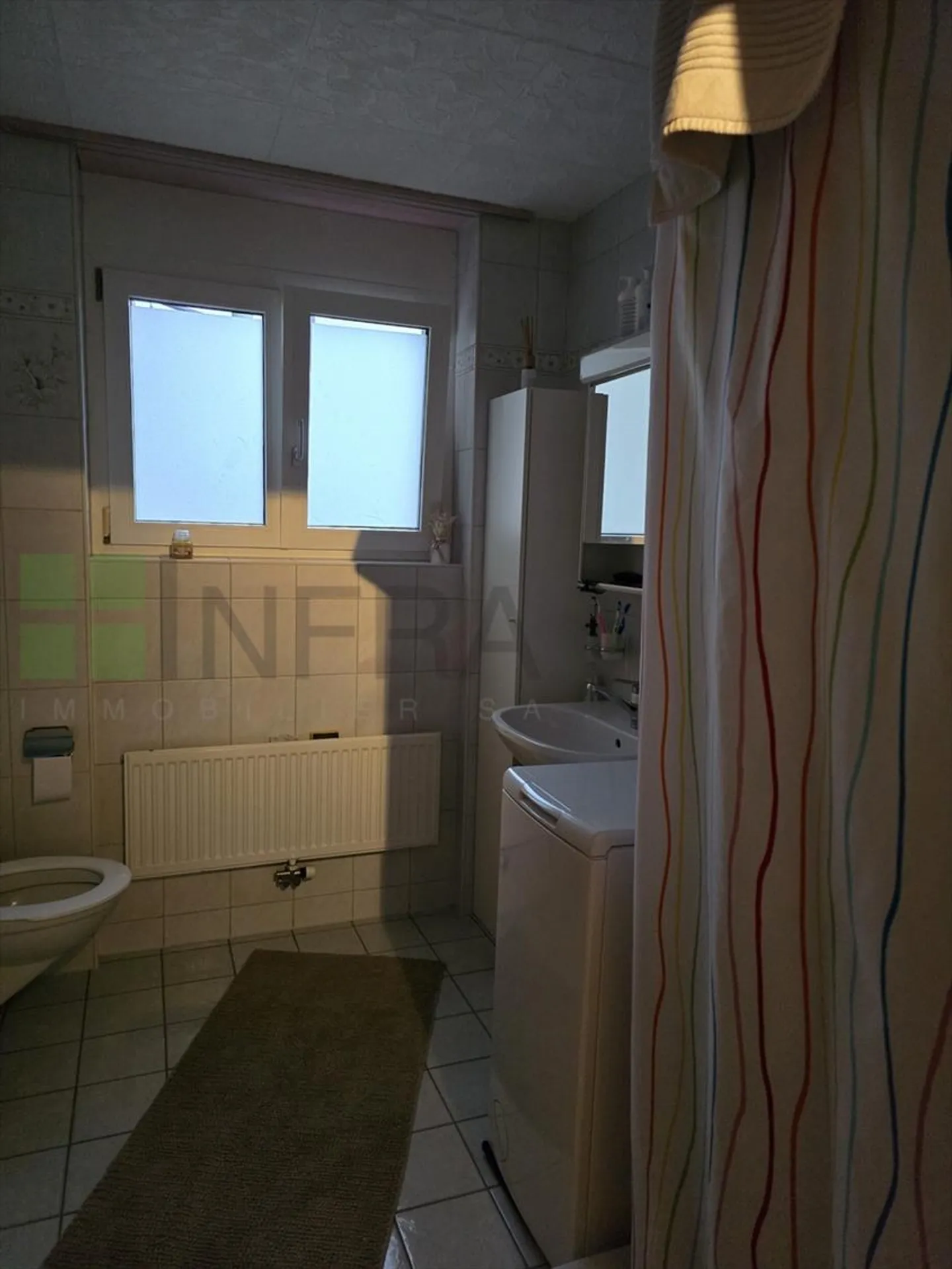 Appartement de quatre pièces au 1er étage avec ascenseur - Photo 8 sur 10
