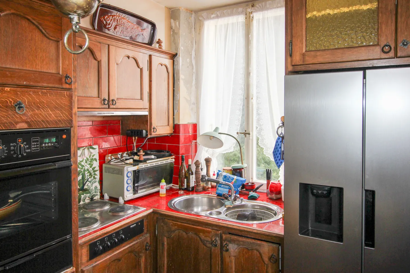 Rental building with 3 (4) apartments, 2 garages and 1 veranda - Photo 13 of 22