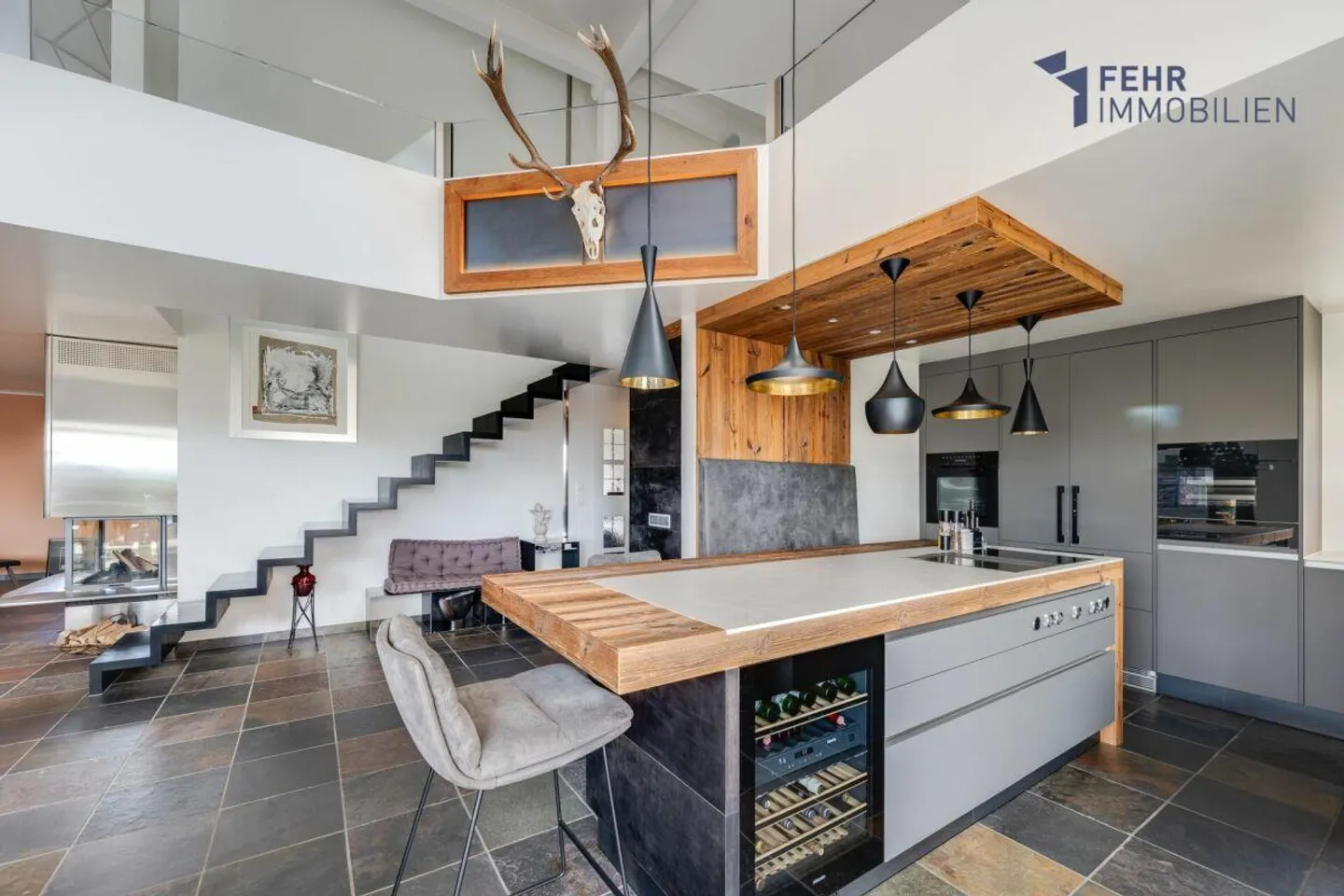 Fehr Immobiliare - Lussuoso appartamento duplex attico 5½ locali con laboratorio - Foto 3 di 13