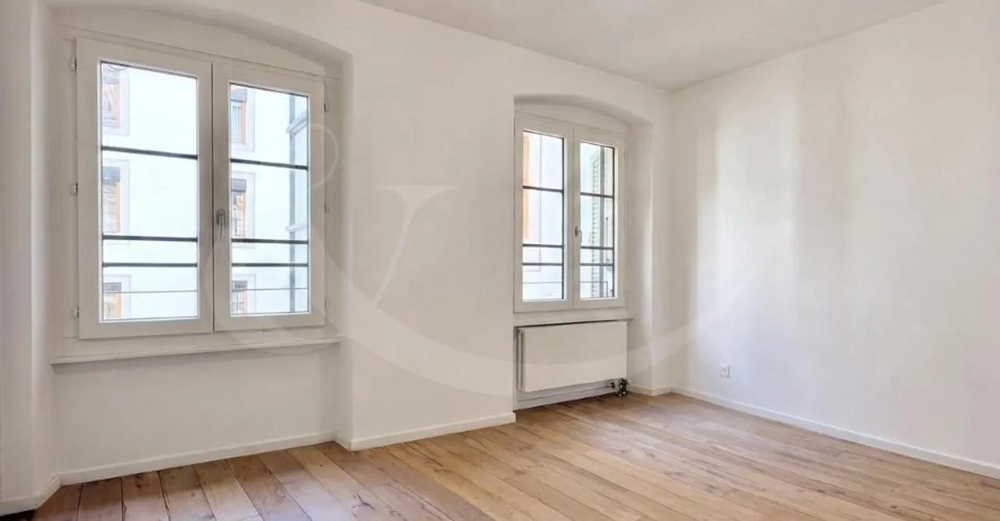 Duplex Charmant dans un Bâtiment Historique - Photo 3 sur 7