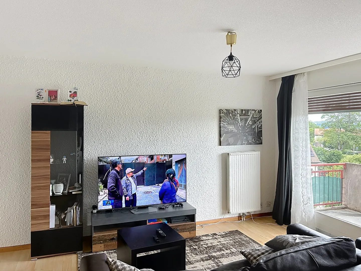 Charmant appartement 3.5 pièces - Photo 2 sur 9