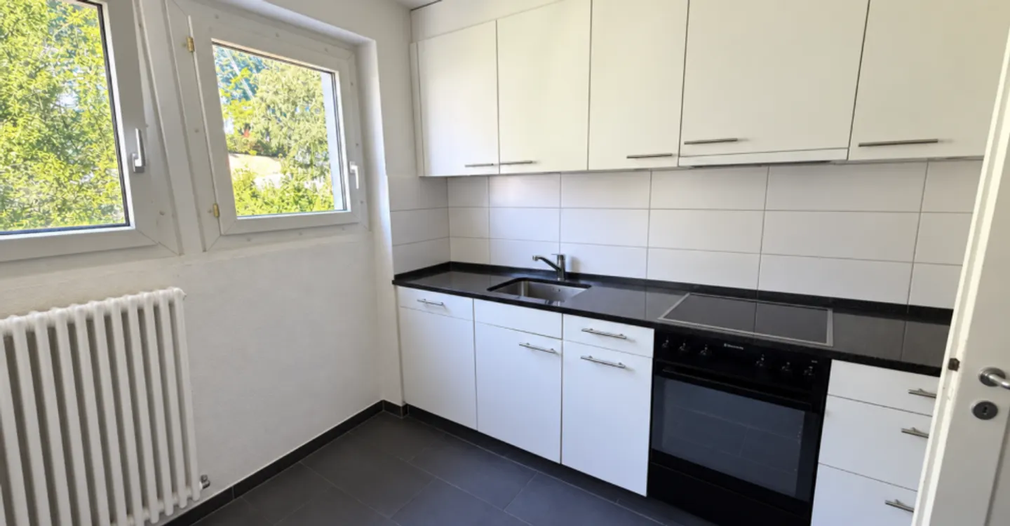 Tramelan, nice renovated 4-room apartment on the upper ground floor, located in a quiet area - Photo 1 of 3