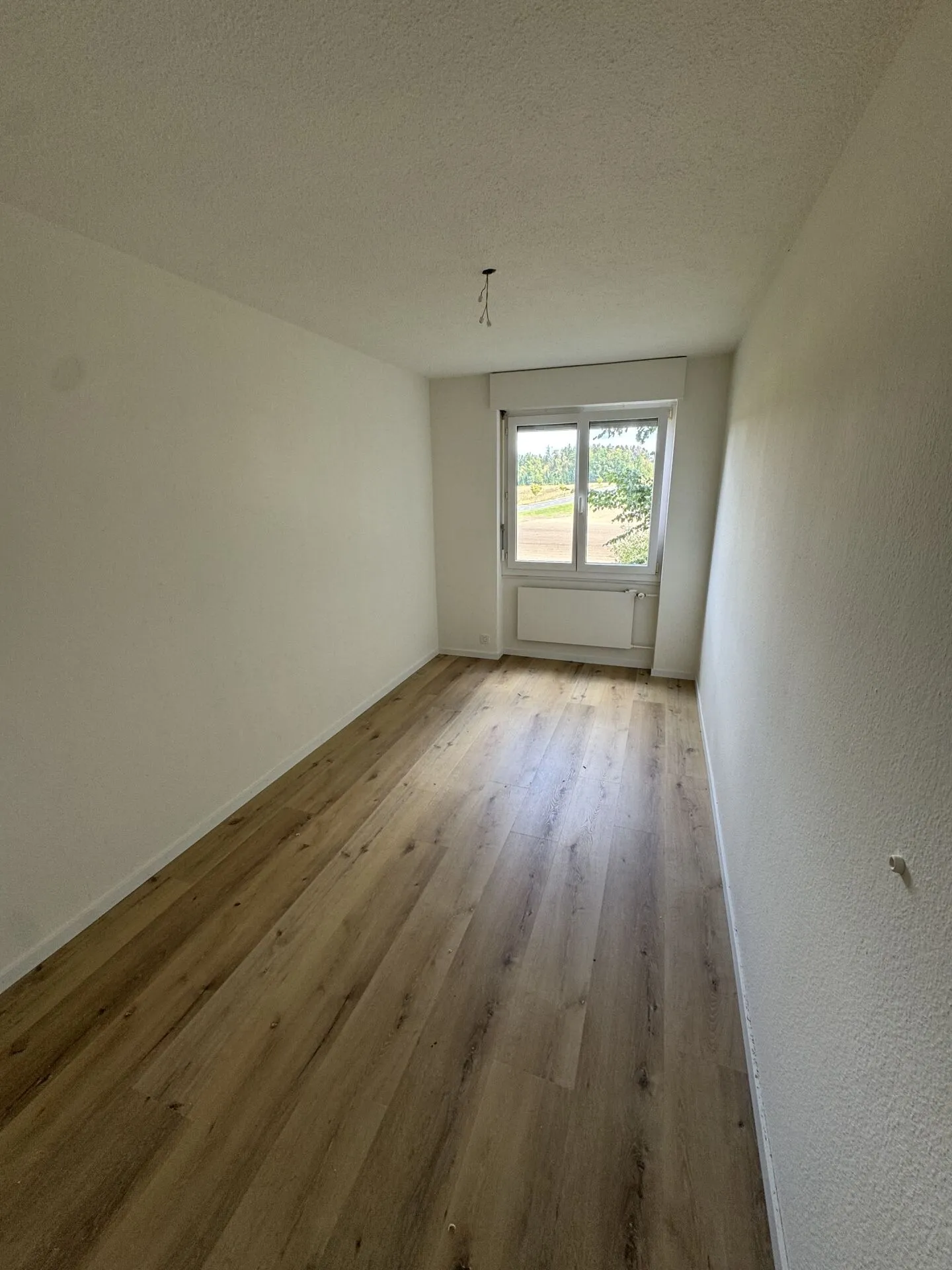 Appartement fraîchement rénové - Photo 8 sur 11