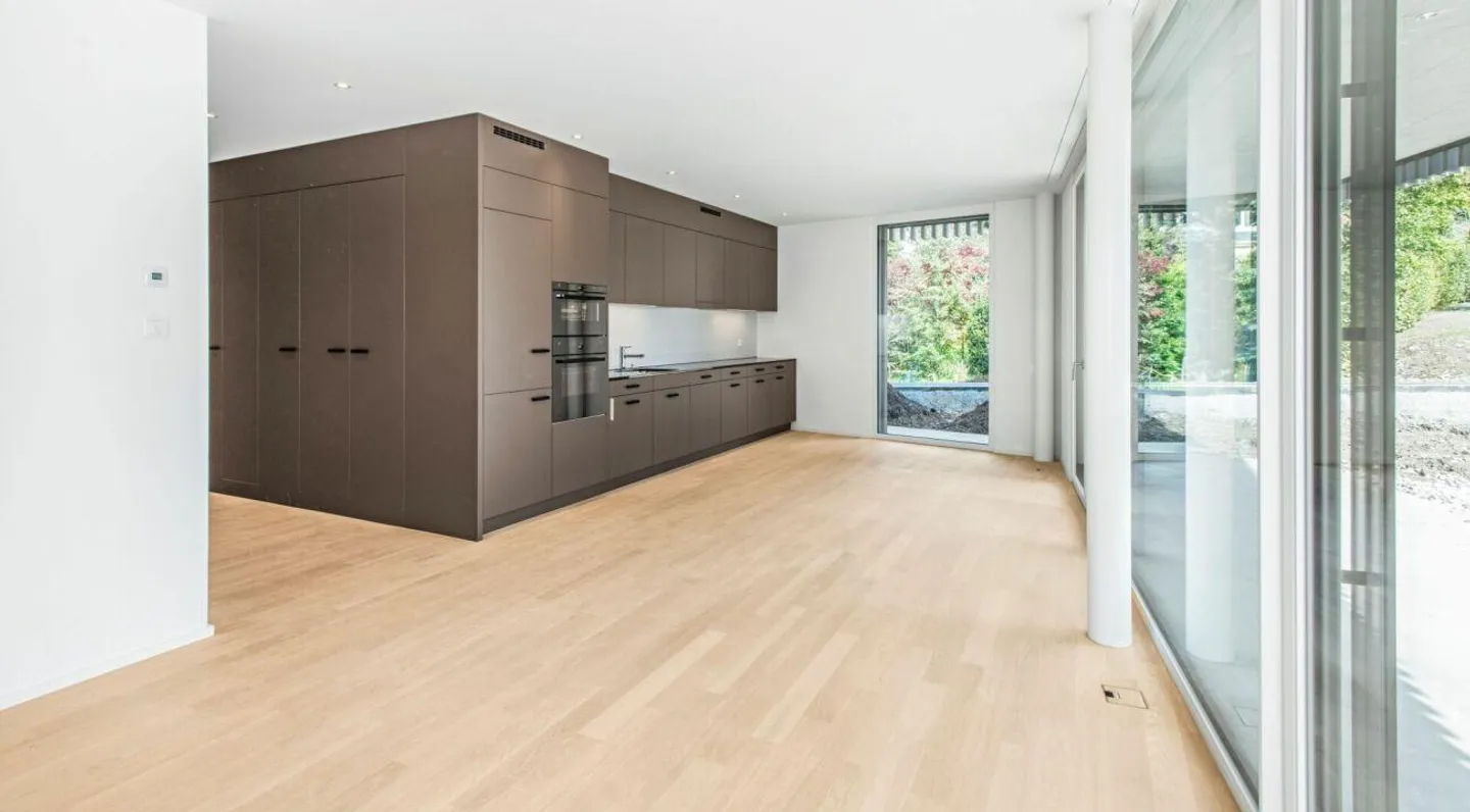 Modern 2.5-room garden apartment with terrace - Photo 2 of 8