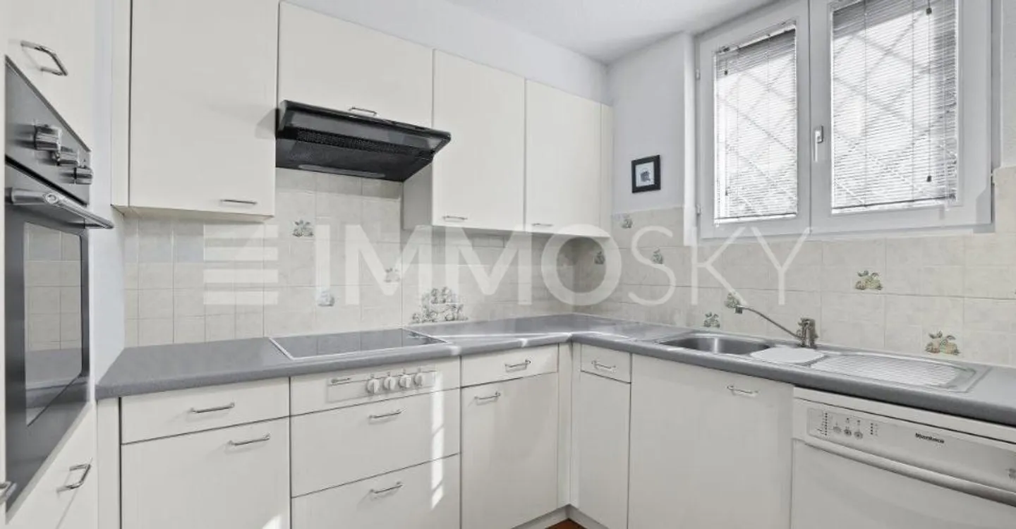 Appartement Charmant en Verdure - Photo 2 sur 5