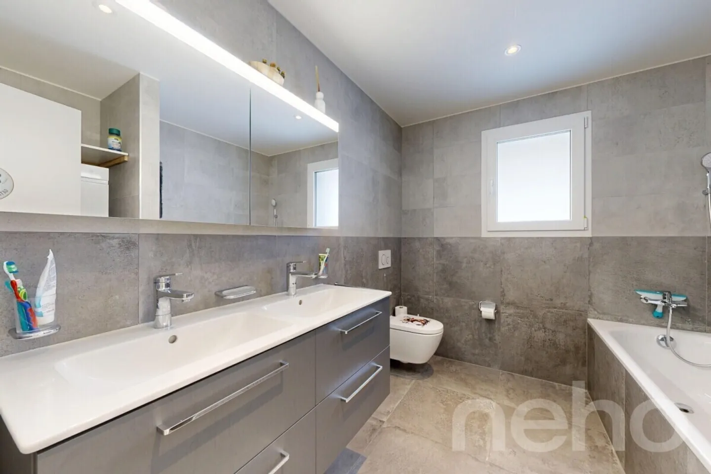 Living with a View: Stylish Terrace Apartment in Plasselb - Photo 10 of 12