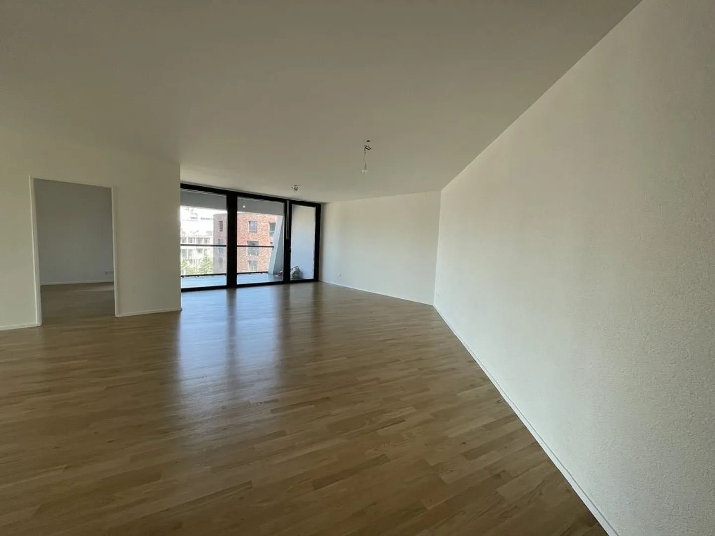 Modern City Apartment: Light, Loggia & Location Above the Rooftops - Photo 2 of 9