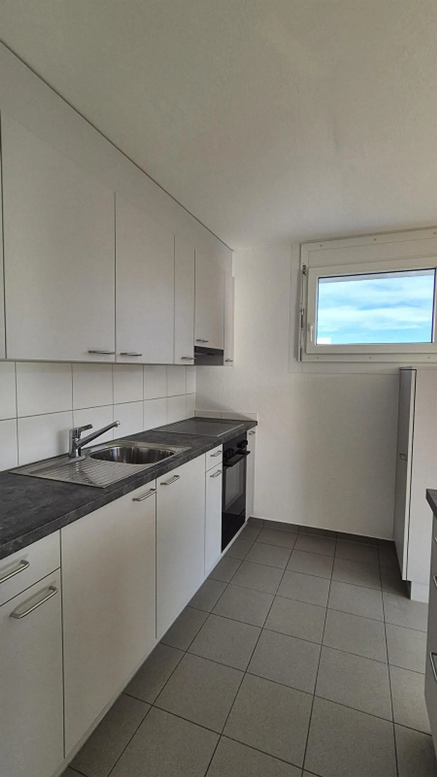 Appartement de 4.5 pièces - Photo 3 sur 4
