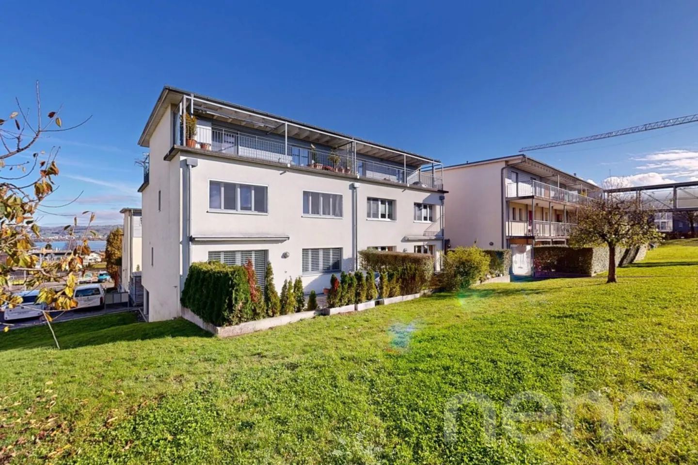 4.5-Room Maisonette Apartment with Lake View in Hünenberg See - Photo 1 of 12