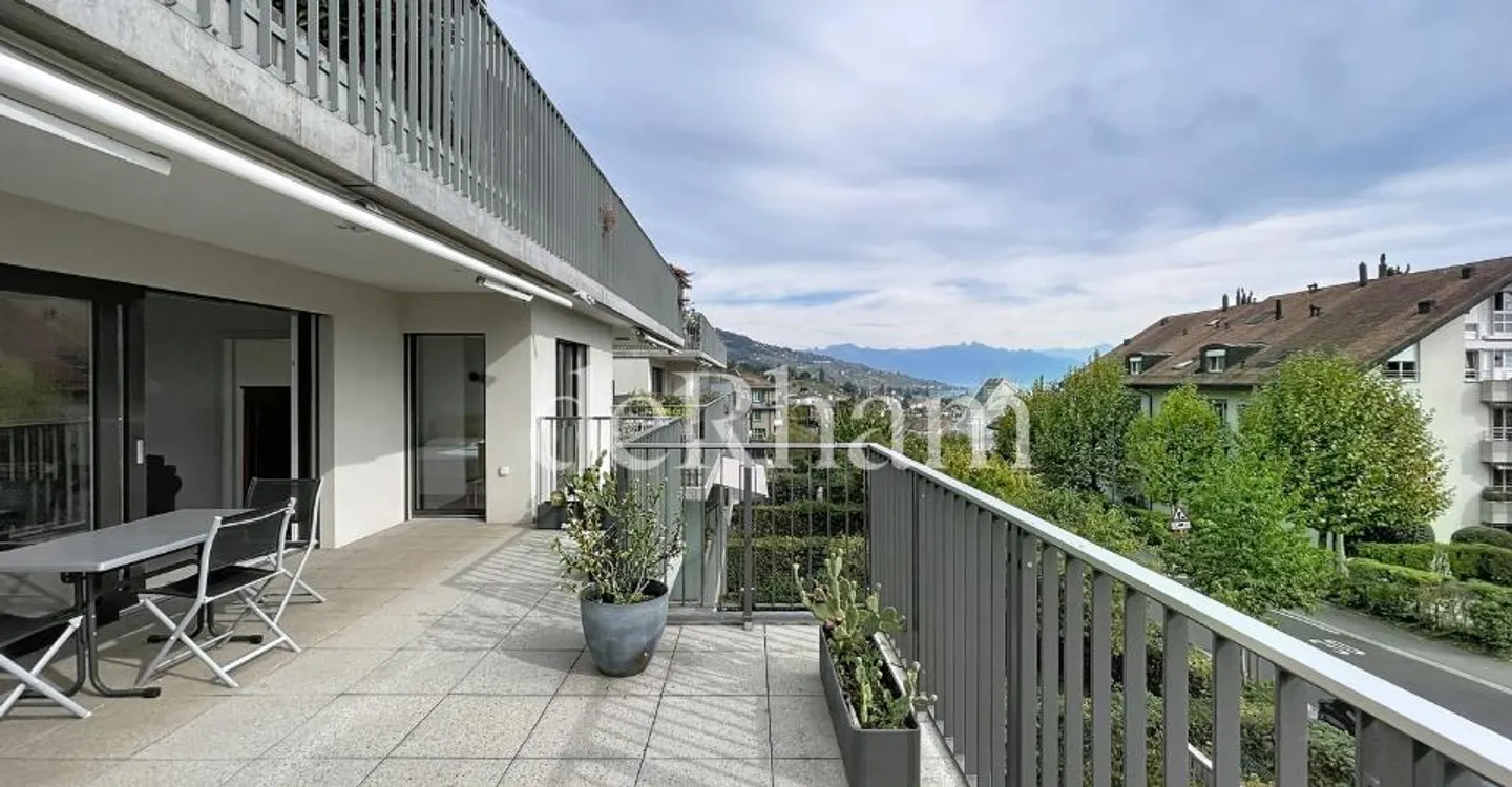 Appartement Charmant avec Vue sur le Lac - Photo 1 sur 10