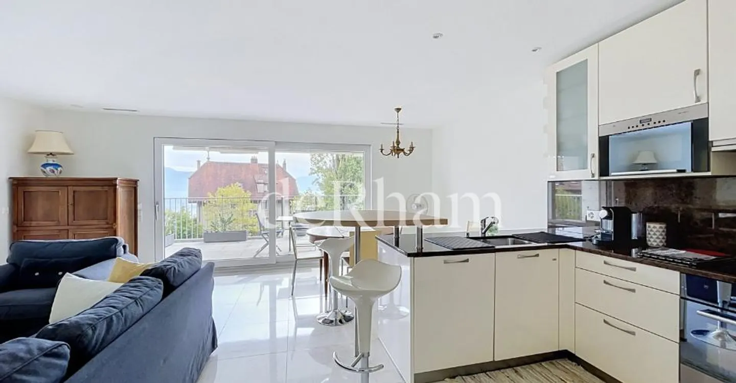 Appartement Charmant avec Vue sur le Lac - Photo 8 sur 10