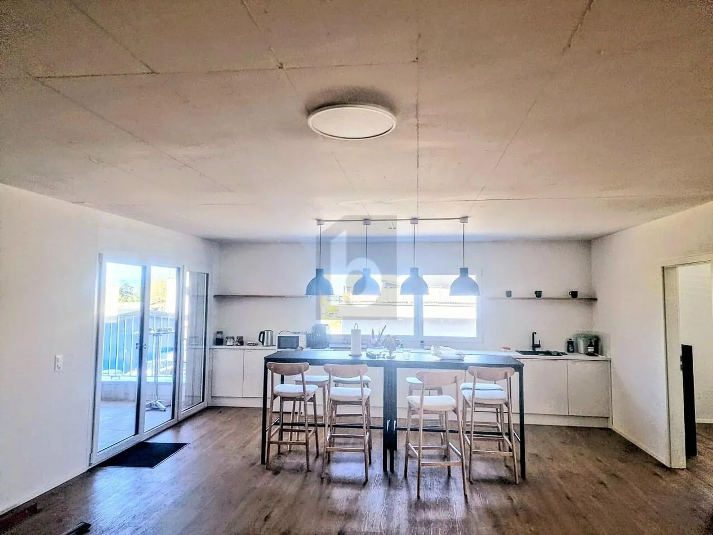 MODERN AND SPACIOUS - Photo 2 of 6