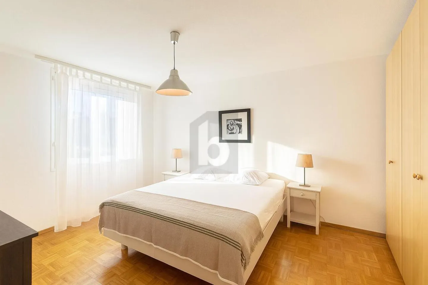 MODERN COMFORT JUST STEPS FROM THE CENTER AND THE LAKE - Photo 4 of 6