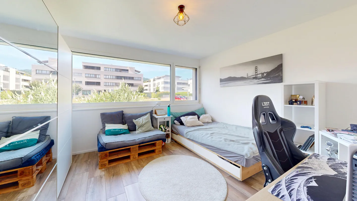 Moderne 4.5-Zimmer-Maisonettewohnung mit Terrasse und eigenem Garten - Foto 15 von 27