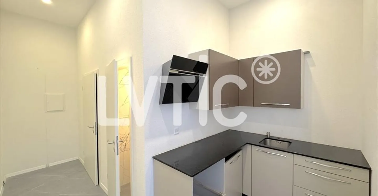 Immeuble mixte à louer - Photo 3 sur 8