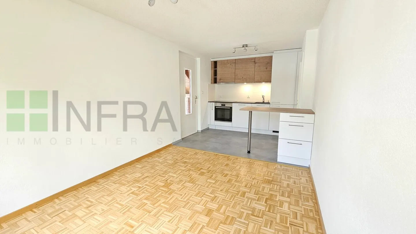 Grand appartement de 2,5 pièces avec garage, buanderie privée et jardin ! - Photo 3 sur 12