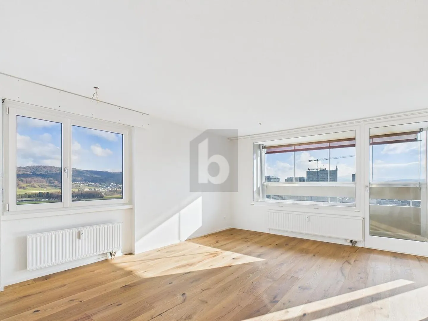 LIGHT-FLOODED WITH A VIEW - Photo 1 of 6