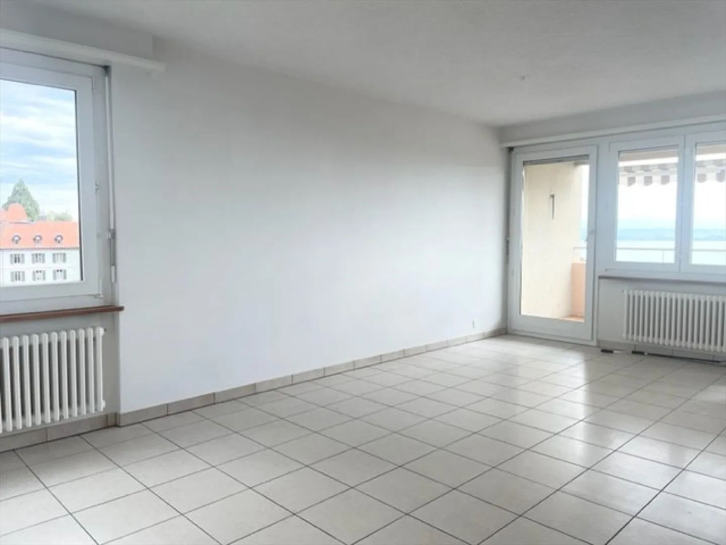 Appartement de 4 pièces avec vue sur le lac et les Alpes - Photo 3 sur 13