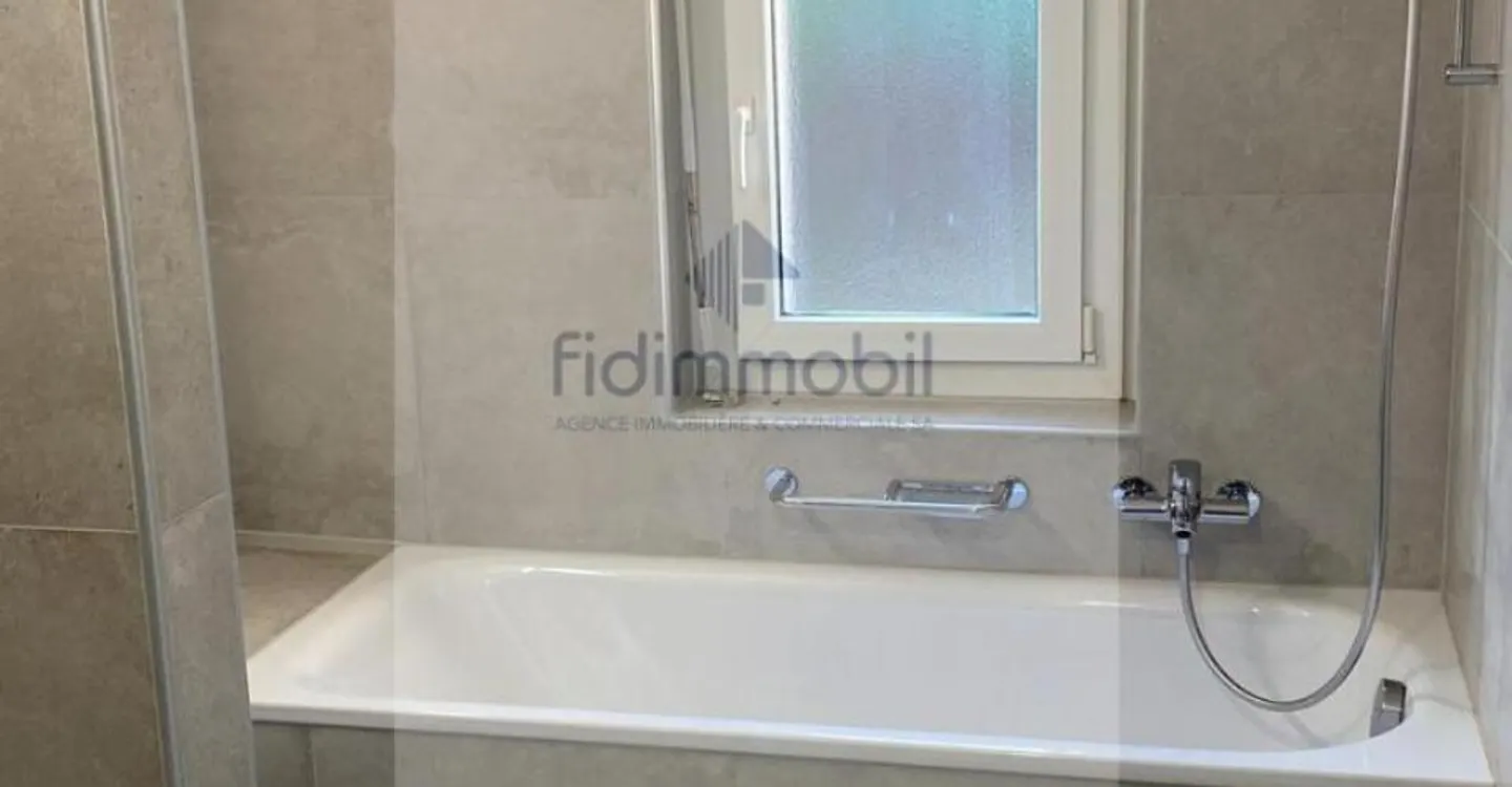 Appartement Entièrement Rénové - Photo 3 sur 4