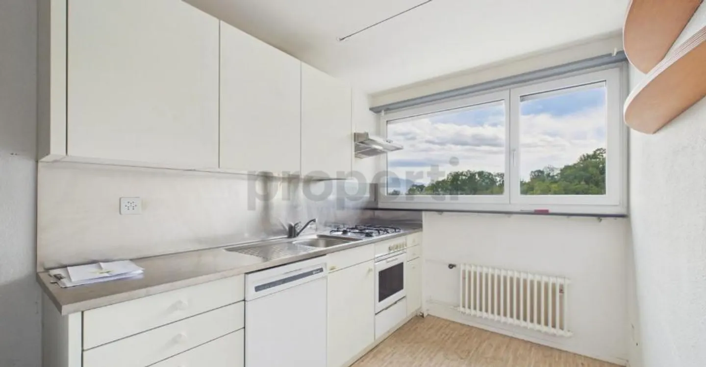 Light-Filled Living with Balcony and Distant View - Photo 2 of 10