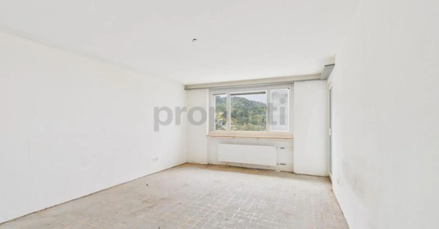 Light-Filled Living with Balcony and Distant View - Photo 5 of 10